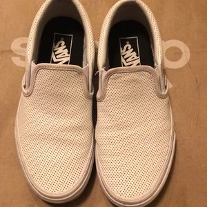 White perforated vans - with small rip shown
